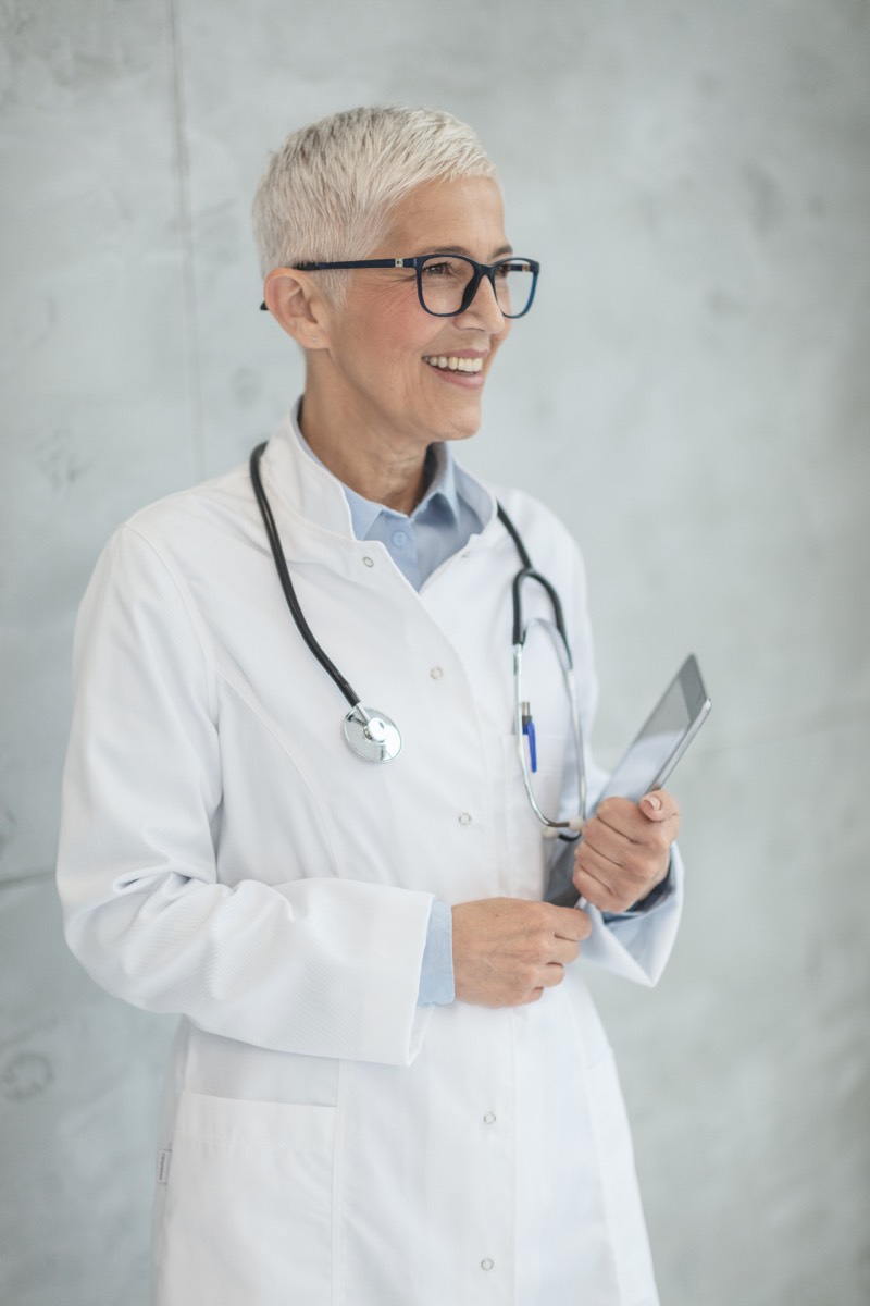 A doctor smiling to camera