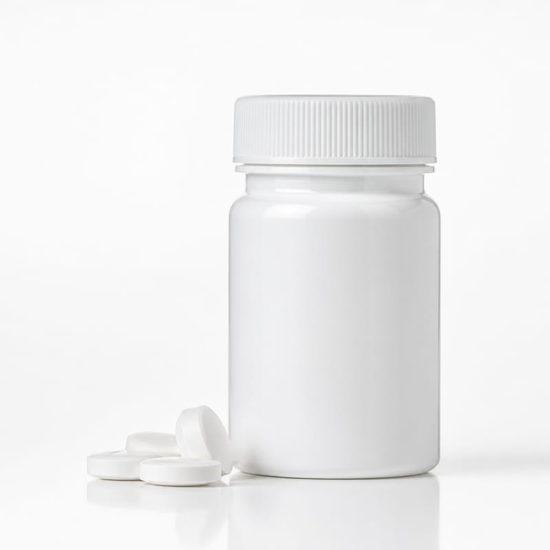Unbranded bottle of biotin tablets